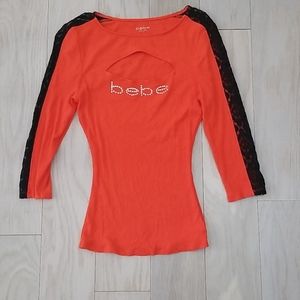13 Bebe shirts for $35